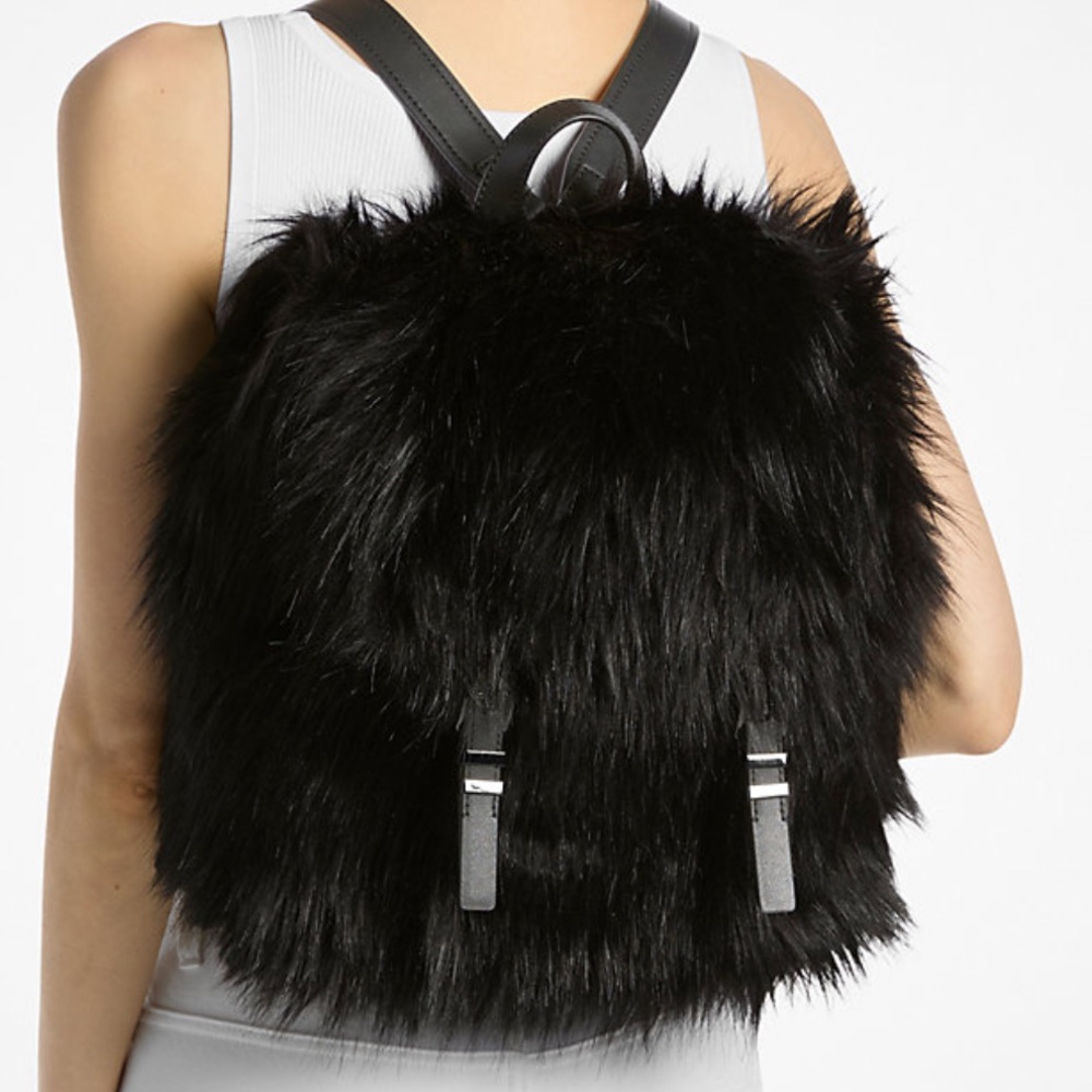 MICHAEL MICHAEL KORS Quinn Medium Flap Faux Fur Backpack
Black
NWT
Live Style - Picture 10 of 16